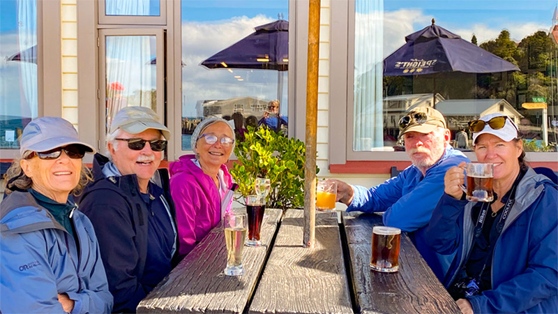 Guests enjoying a well deserved beer on Stewart Island