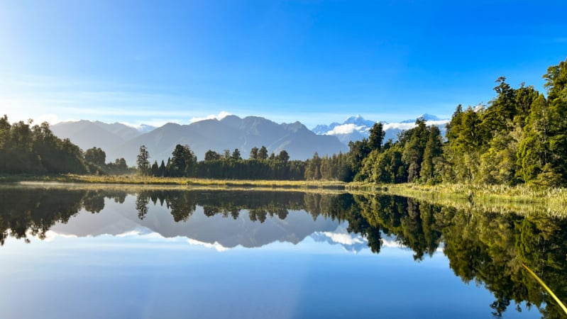 Glassy reflections across Lake Matheson.