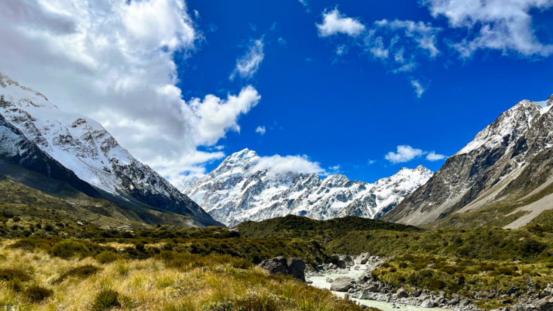 The Hooker Valley, blue skies and the beautiful surrounding mountains.