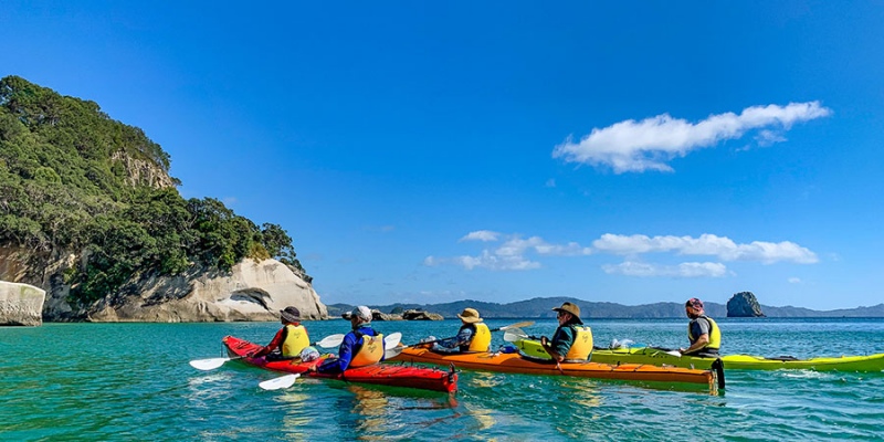 Kayaking Cathedral Cove with travel insurance New Zealand