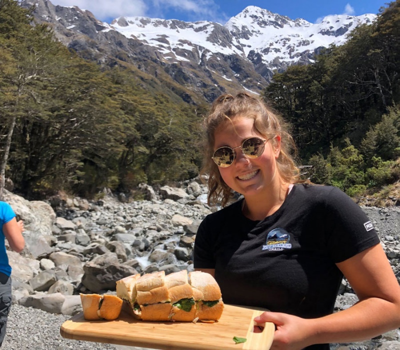 Guide serving sandwiches, Arthurs Pass