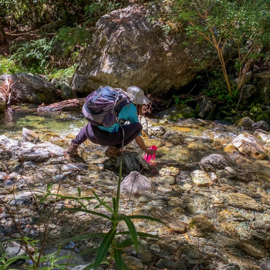 Collecting water at Mount Creighton, Otago New Zealand