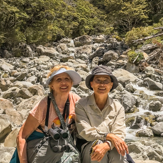 Couple at Arthurs Pass National Park's river, Canterbury New Zealand