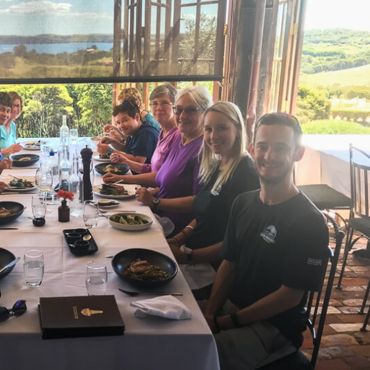 Group having lunch at Waiheke Island, Auckland New Zealand