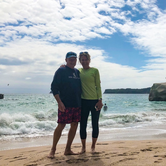 Couple at Cathedral Cove beach