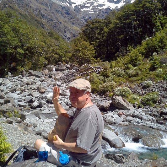 hiker at arthurs pass river